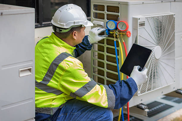 Professional Heat Pump Repair technician working in San Marcos, TX